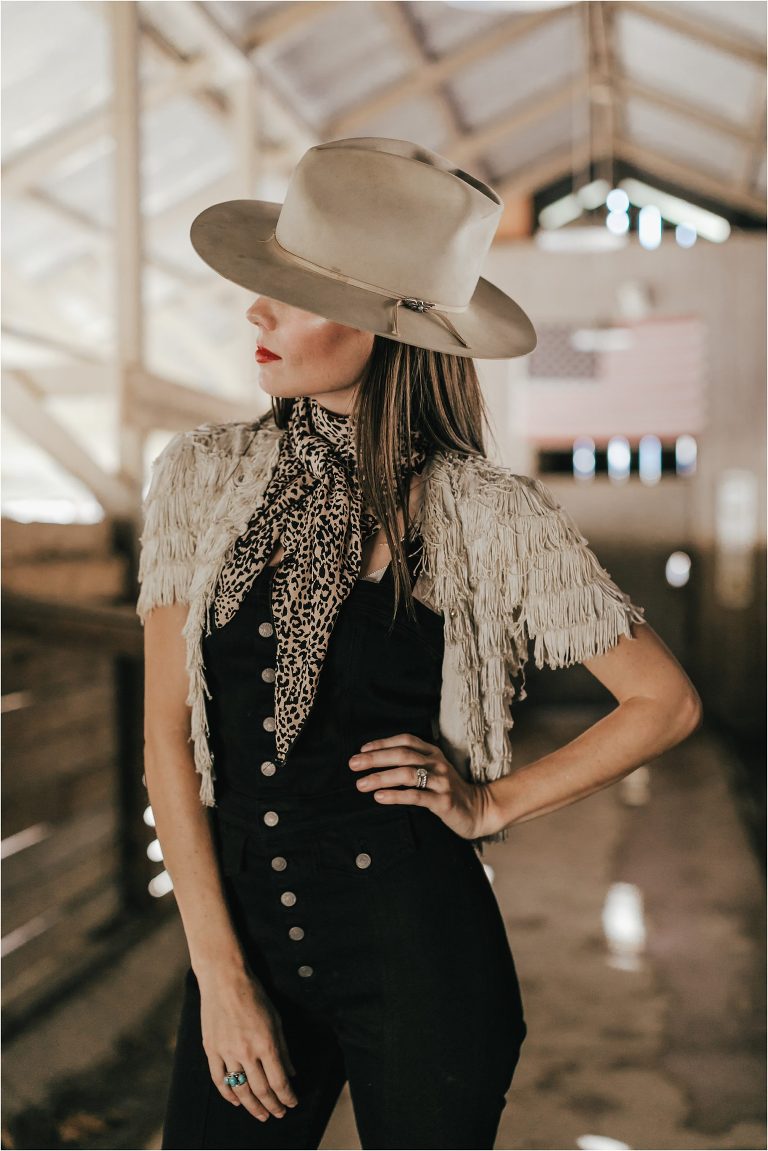 Western Fashion Style Inspo on the farm with Lindsay Branquinho in an old barn aisle and a vintage Stetson hat by Elizabeth Hay