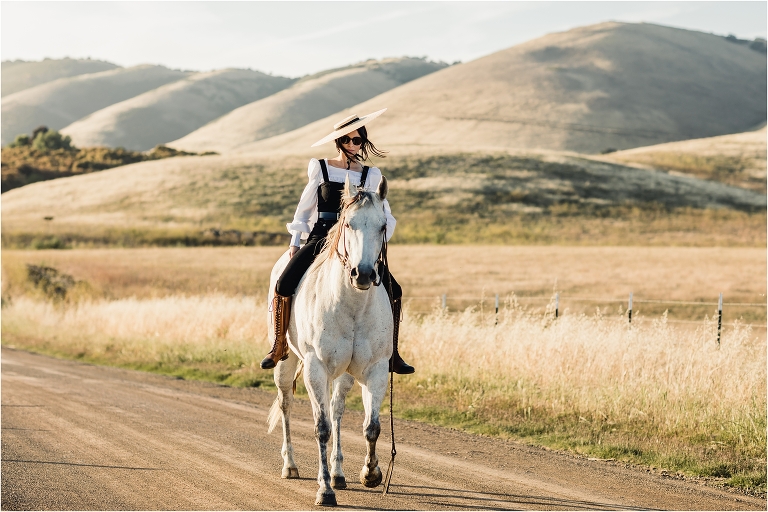 woman riding grey mare on Nipomo back road by California Equine Photographer Elizabeth Hay 
