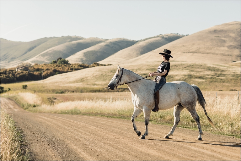 Equine Photographer Milton Menasco photo shoot in Nipomo California by Elizabeth Hay Photography of woman riding grey horse
