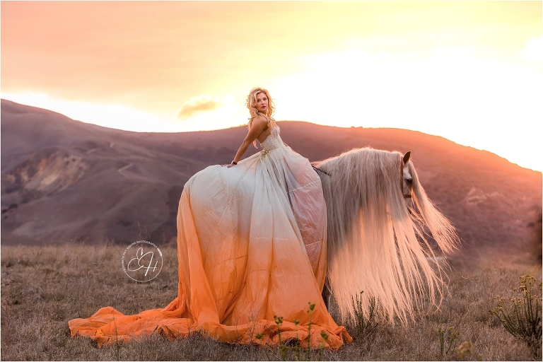California Equine Photography workshop by April Visel in Santa Ynez, California with images of woman wearing orange parachute dress and Andalusian stallion in field by Elizabeth Hay Photography.