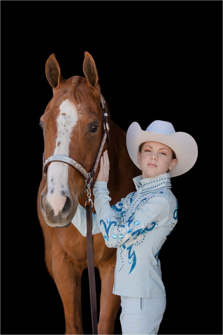 girl wearing AQHA showmanship outfit with sorrel gelding black background portrait by California Equine Photographer Elizabeth Hay Photography. 