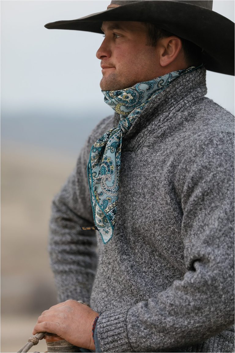 cowboy wearing a blue paisley wild rag during a Western Wild Rags Photoshoot with Buck Wild Rags in Bakersfield by California Horse Photographer Elizabeth Hay Photography.