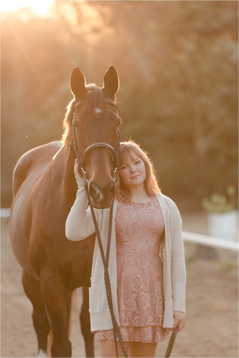 San Luis Obispo graduating senior resting her head against her horse at LOVE Farm by California Equine Photographer Elizabeth Hay Photography.